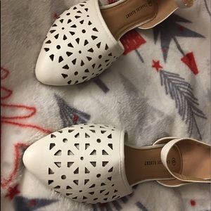 Women’s beautiful white flats